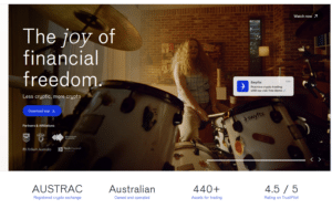 "Promotional banner for Australian crypto exchange showing woman drumming with tagline 'The joy of financial freedom' – highlighting AUSTRAC registration, 440+ assets, and 4.5 TrustPilot rating."